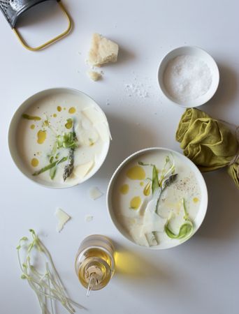 Kitchenware and condiments near asparagus cream soup