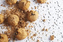 Homemade cookies with crumbs on table