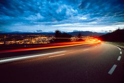 View of abstract shines on road at night