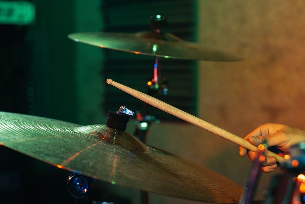Drummer In Stage With Colorful Lights