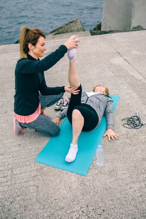 Female trainer with Older woman