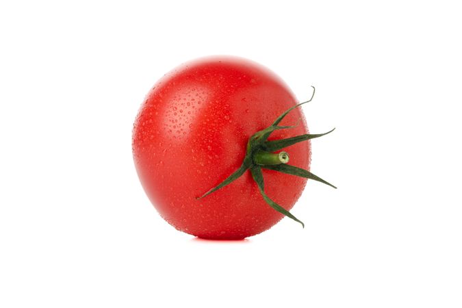 Fresh ripe tomato isolated on plain background