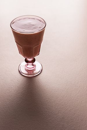 Smoothie in a glass in dull lighting