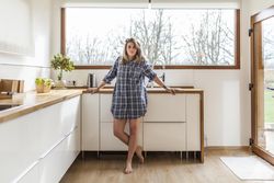 Woman at home in the kitchen