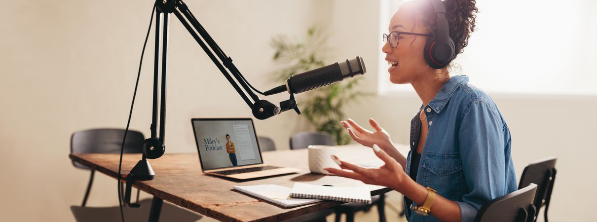 Female broadcasting her podcast from home