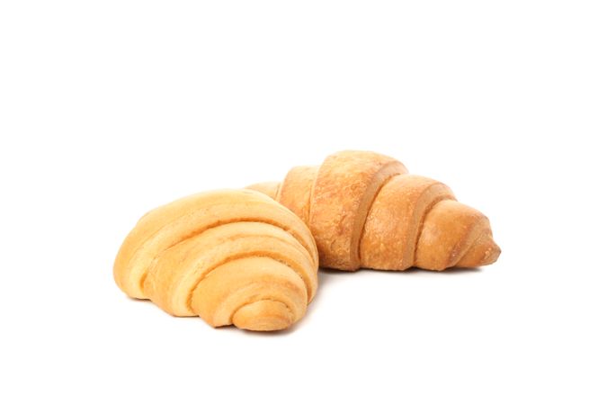 Freshly baked croissants sitting in blank background