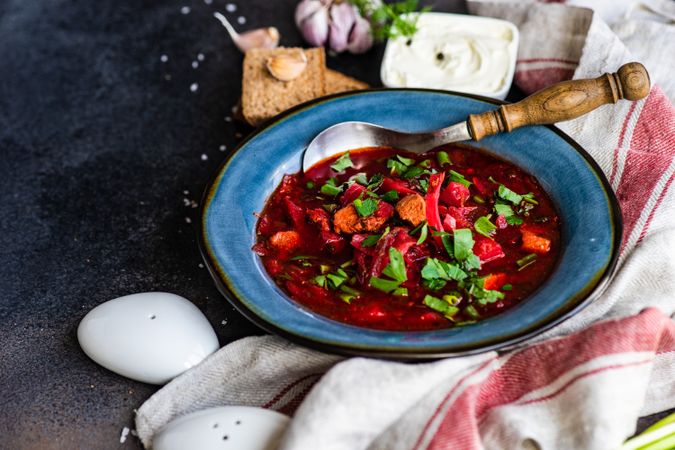 Ukrainian beetroot soup borscht with spoon