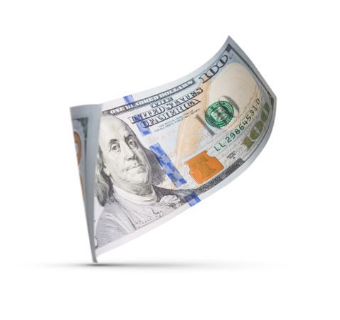One Hundred Dollar Bill Floating Down To Surface with Drop Shadow
