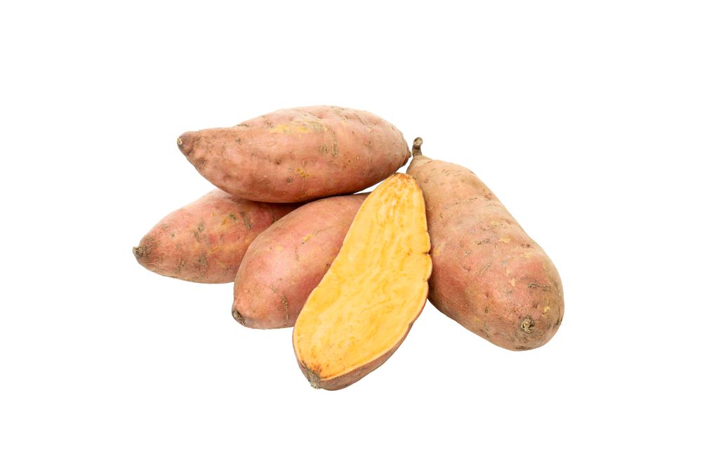 Sweet potato roots, isolated on blank background