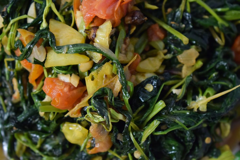 Close up top view of cooked spinach dish