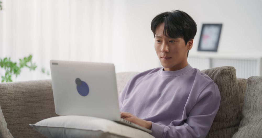 Focused South Korean Professional Telecommuting from Home