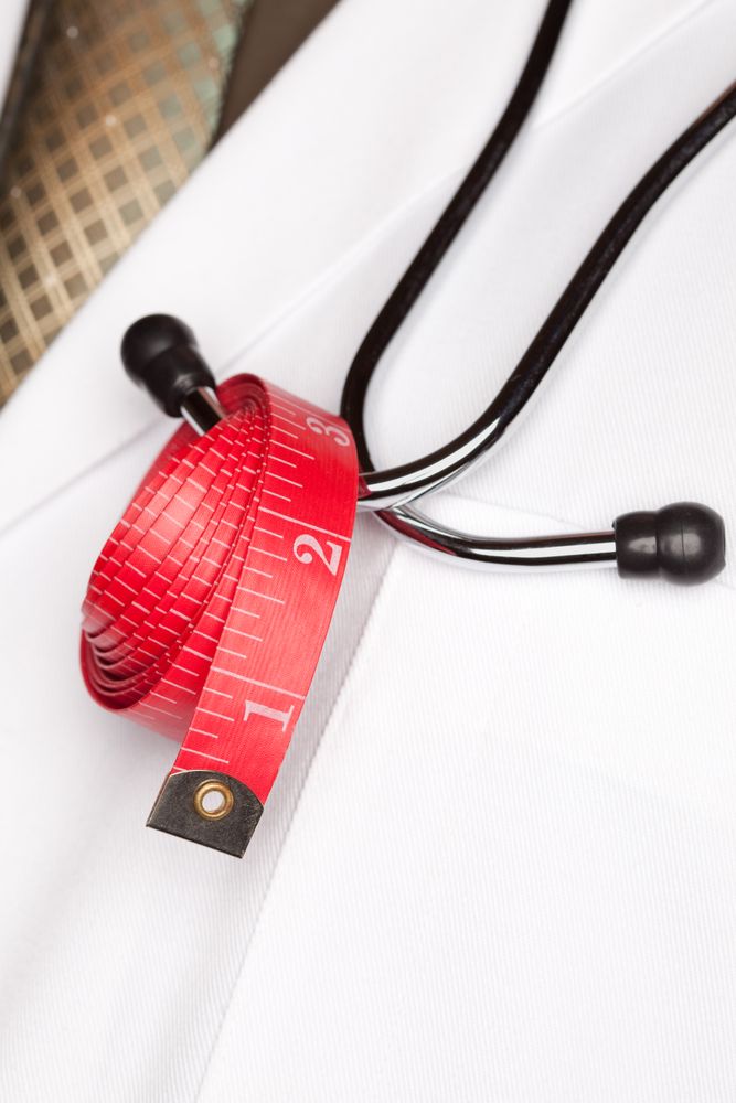 Doctor with Stethoscope and Measuring Tape