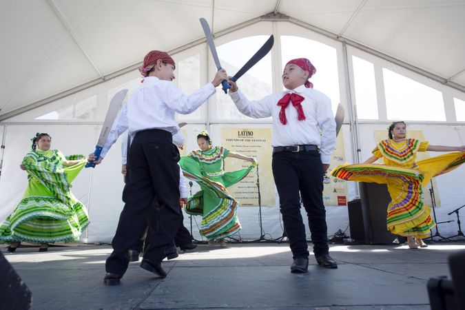Des Moines, Iowa, USA - September 26, 2015: Children perform the traditional Machete Dance