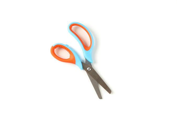 Stationery color scissors isolated on plain background