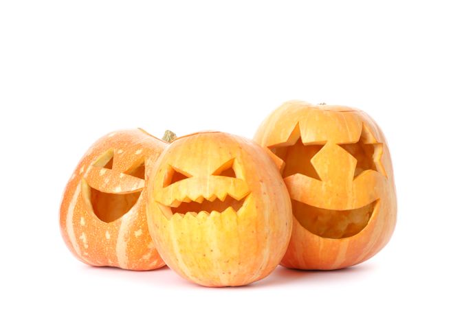 Halloween decorative pumpkins isolated on plain background
