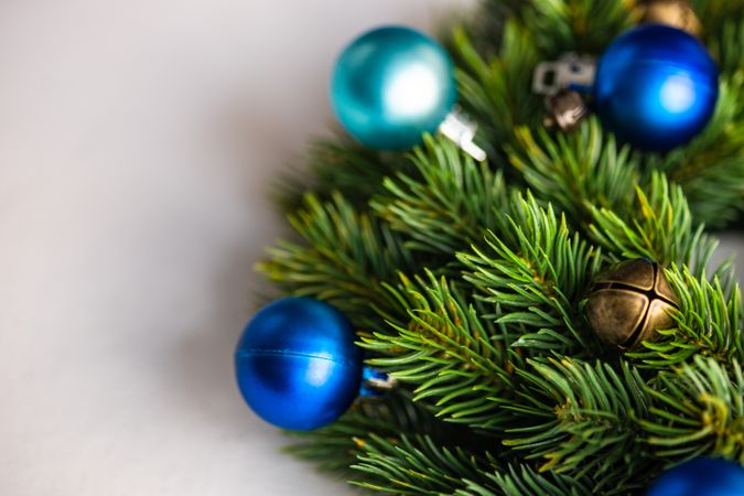 Close up of Christmas wreath with blue baubles