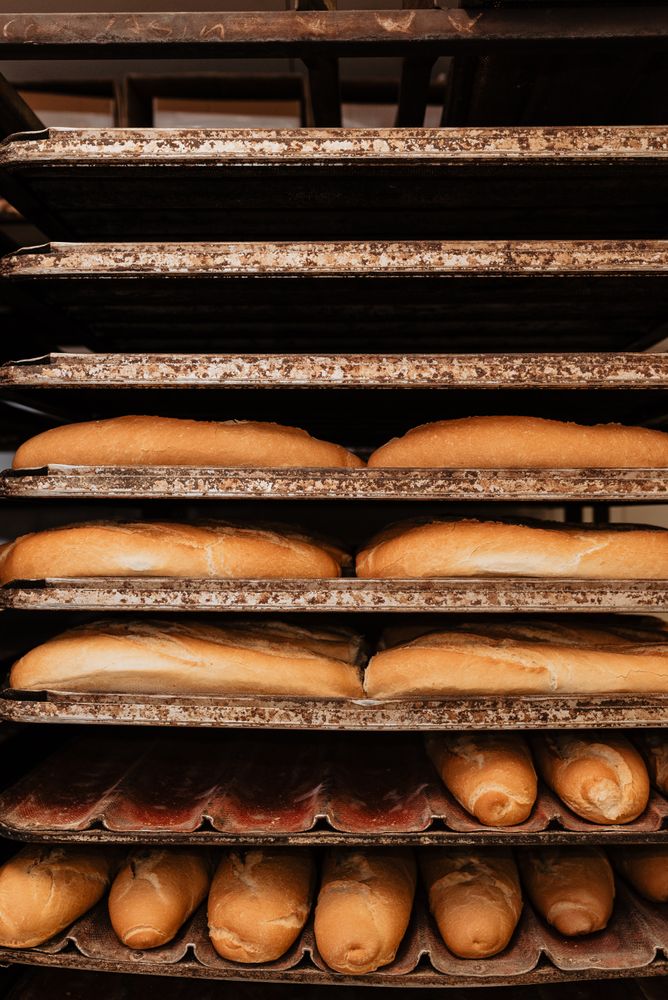 Shelves with fresh bread and buns