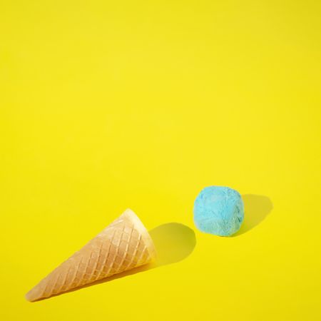 Ice cream cone and blue scoop