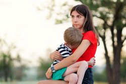 Affectionate mom with son outdoor