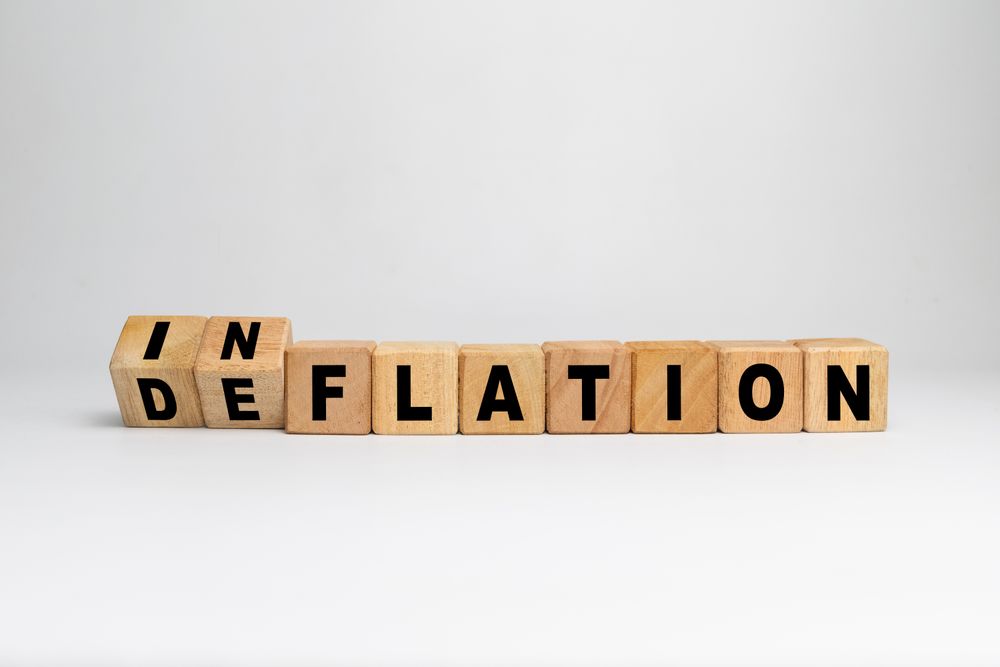 inflation and deflation on turn wooden blocks