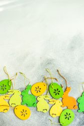 Easter holiday concept with colorful flat egg & rabbit decorations