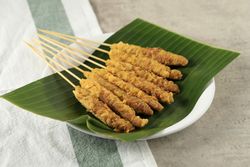 Egg skewers on banana leaf, a popular street food in Indonesia