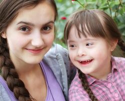 Two sisters together outside