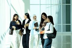 Five Asian College Student Classmate Standing at Campus Hallway