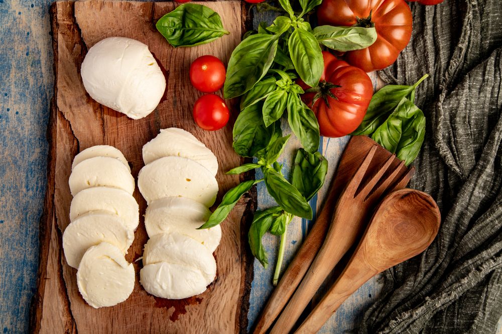 Salad ingredients on board and napkin