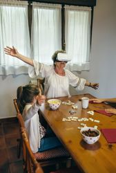 Woman using virtual reality glasses