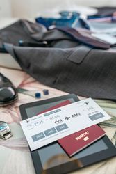 Business trip preparations with boarding pass