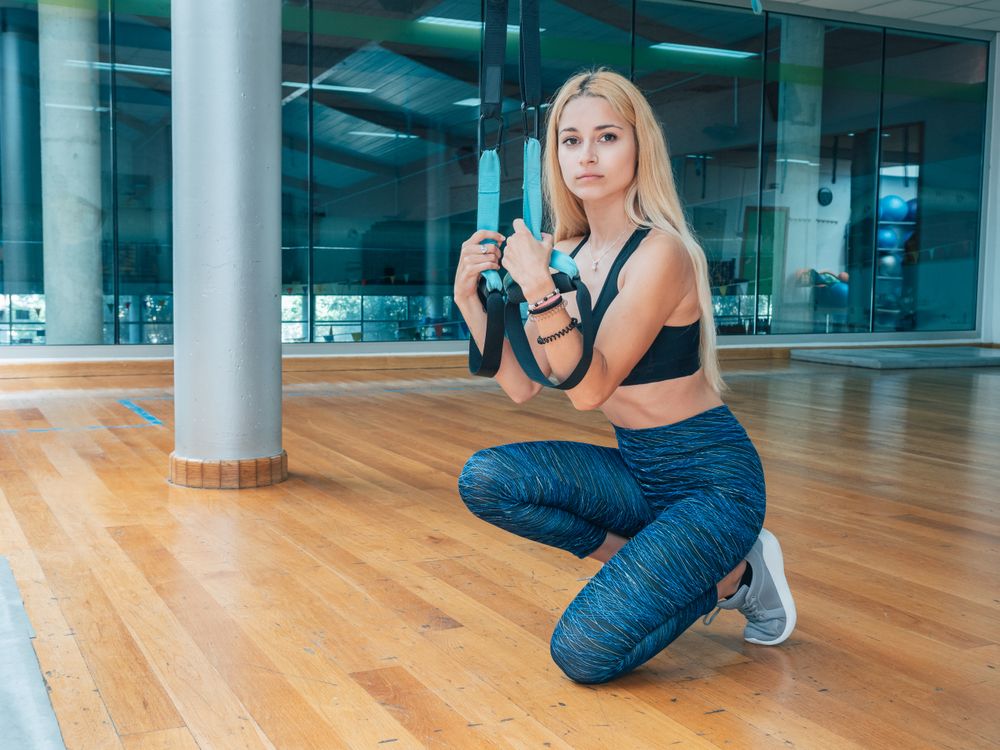 Young female training at the gym