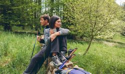 Couple pausing while doing trekking