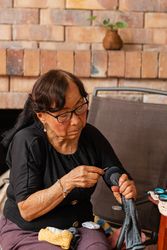Yarn dreams: woman's creative escape.