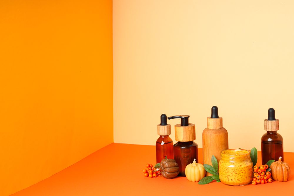 Skin care and face care concept - pumpkin cosmetic
