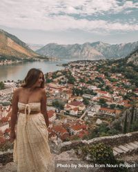 Woman posing on hill beside Kotor Fortress, Montenegro 5p1Mw4
