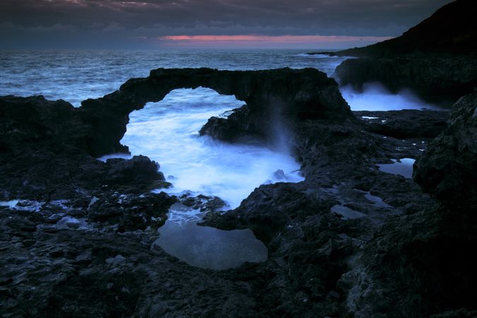 Amazing stone shore and cloudy sky