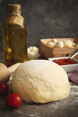 Ingredients for cooking pizza on gray background