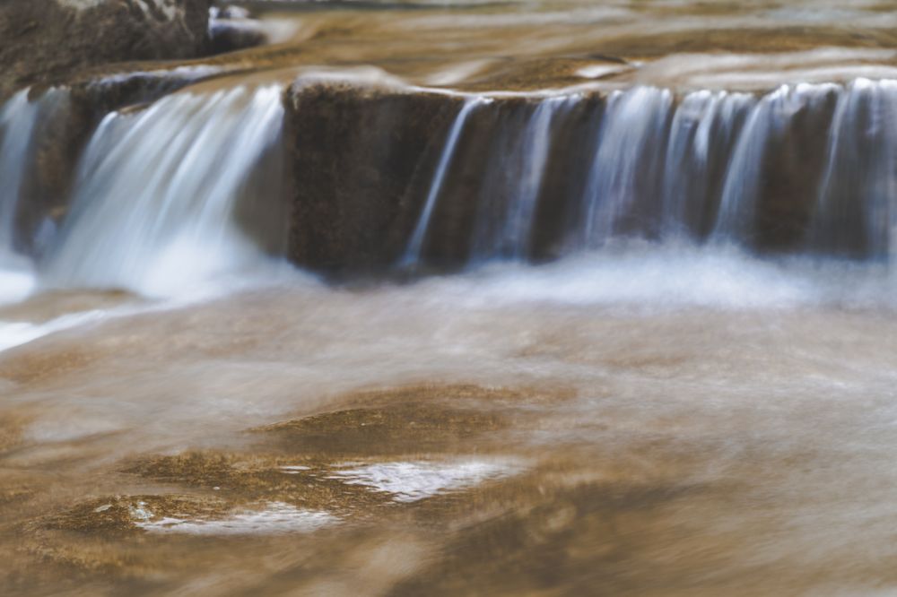 Small waterfall near pond