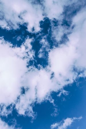 Clouds in sky, vertical composition