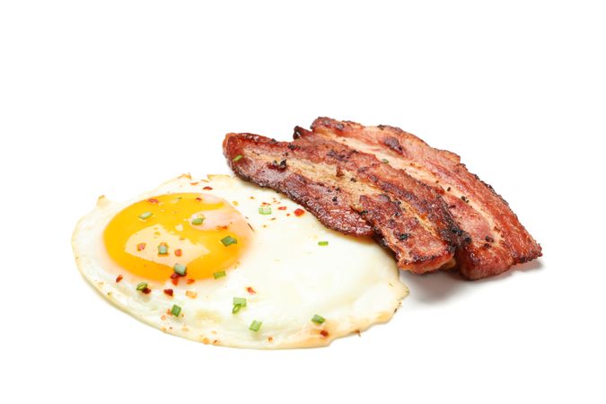 Fried eggs and bacon rashers
