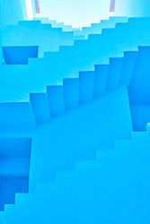 Blue building with straight interesting stairs