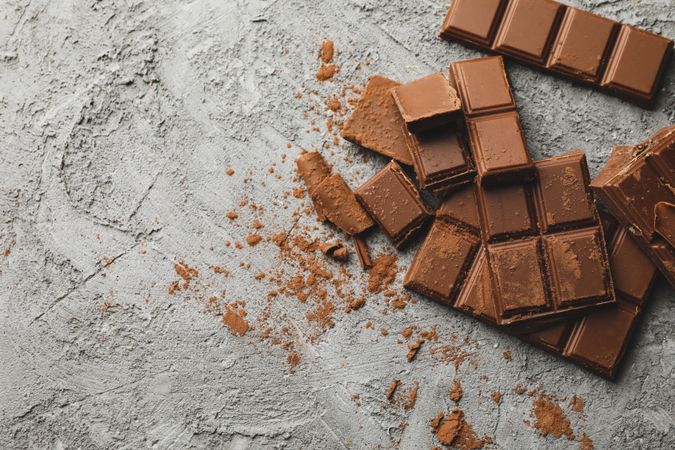 Tasty chocolate on gray background. Sweet food