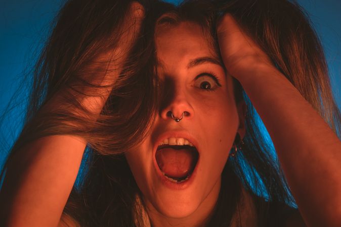 woman touching her hair