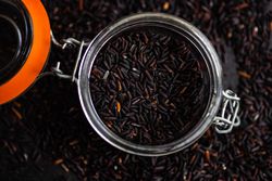 Top view of jar of dark rice
