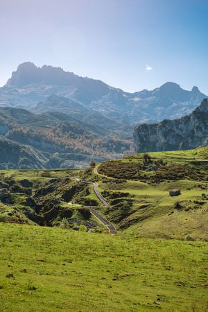 Landscape with path between mountains