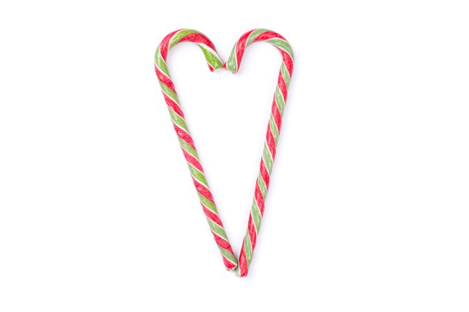 Sweet candy canes isolated on blank background
