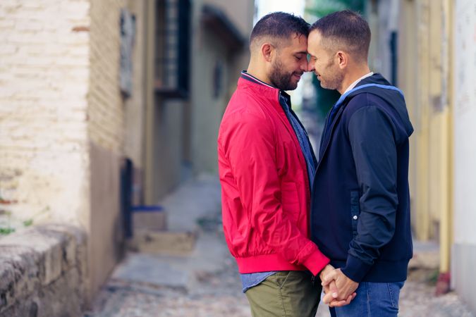 Two men having romantic moment in European city
