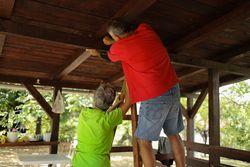 Older couple working on their home.