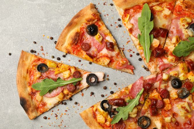 Tasty meat pizza on gray background, top view